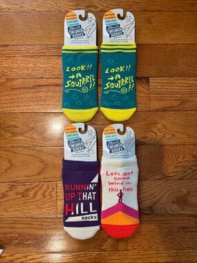 Blue Q Novelty Socks - Teal/Yellow, Purple/White, Cream/Multi